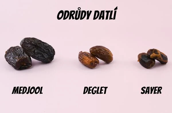 Tři druhy datlí: medhul, deglet noor a sayar na růžovém pozadí.